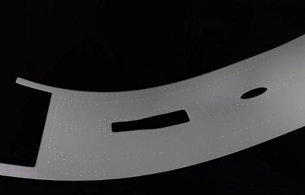 Product shot of metal part on black background