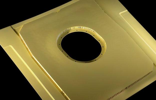 yellow metal product on black background