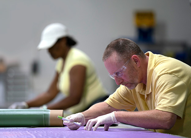 man and woman working at a table