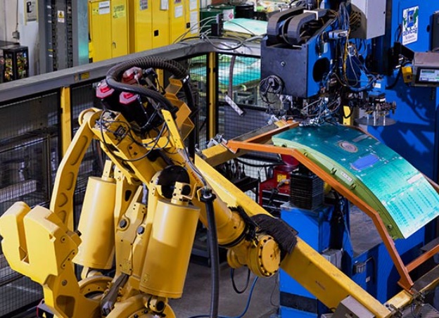 A machine assembling a door