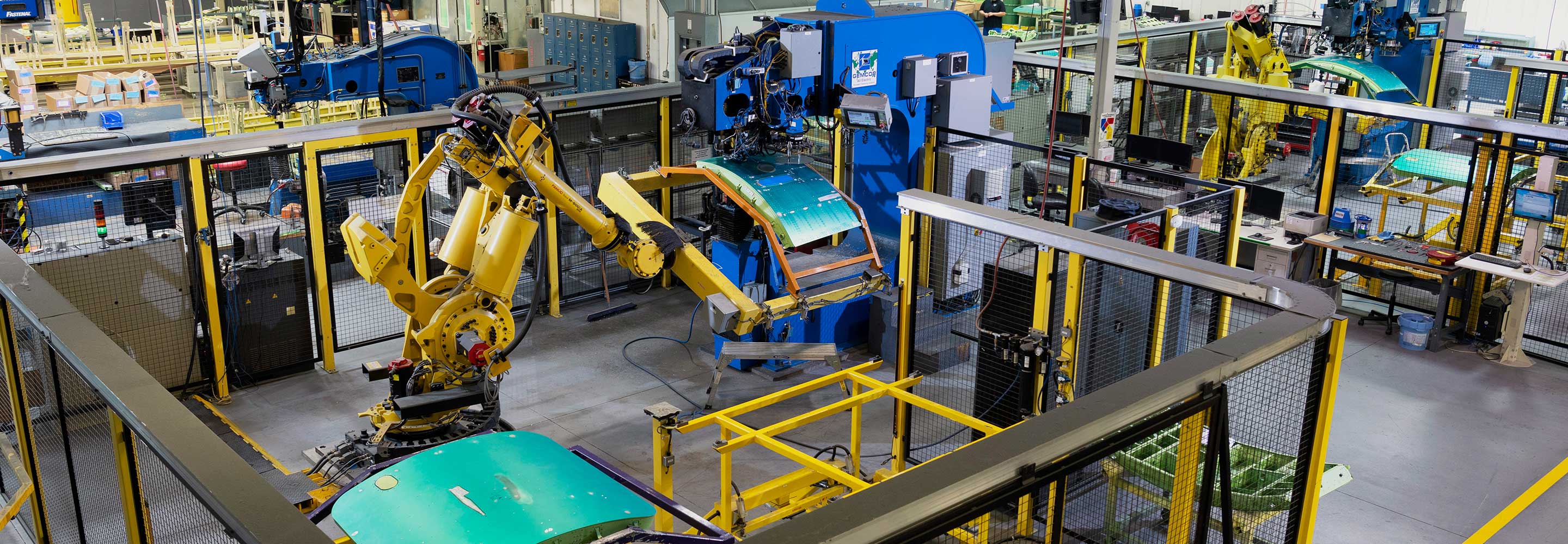 Overhead view of factory with robots